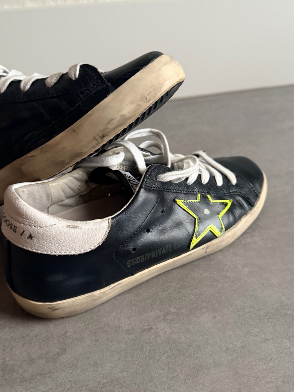Golden Goose Womens Black Leather Sneakers with Neon Star Accent